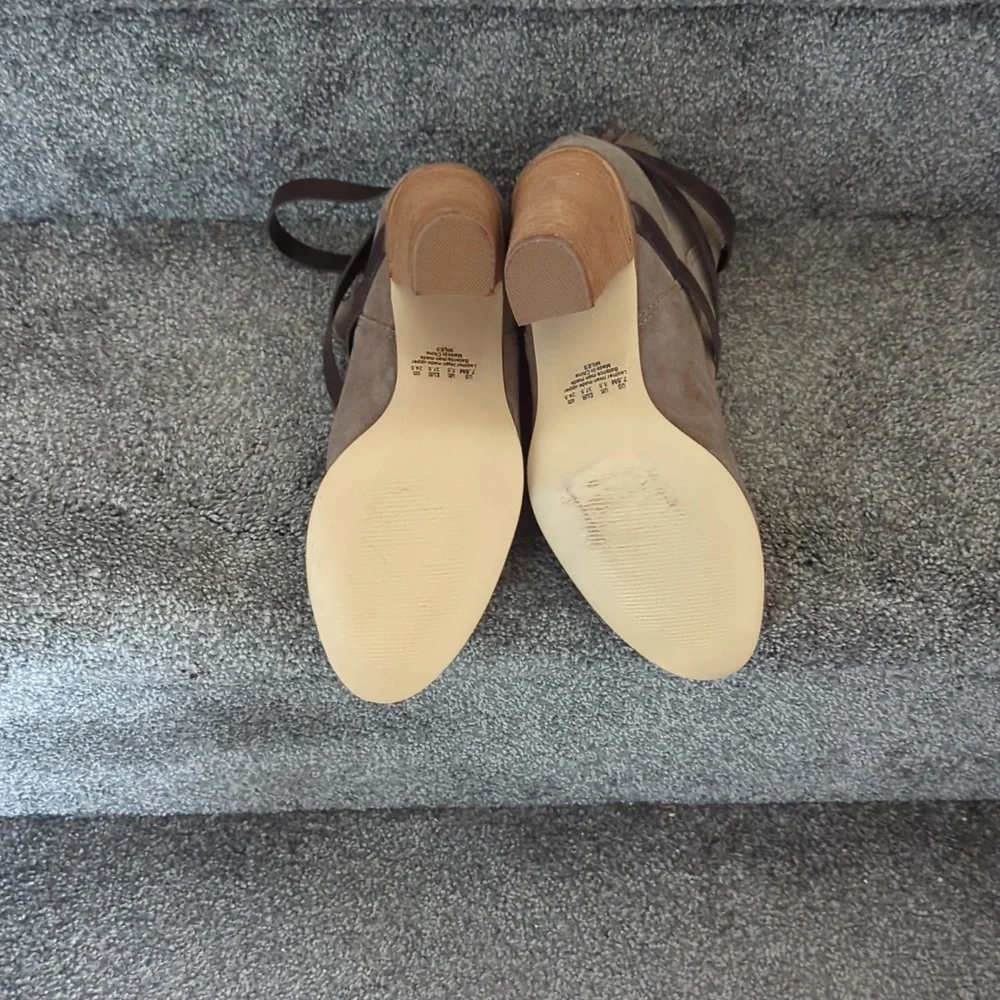 Ankle booties by Carlos Santana